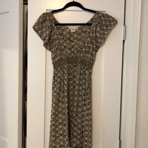 Black beige and gold dress